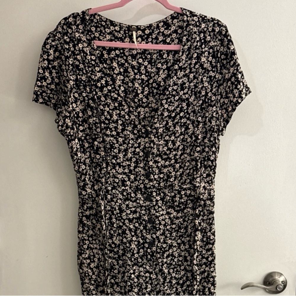 Free People Women's Jumpsuit Size 10 short sleeves with a neckline and a belt